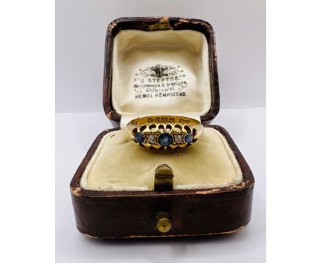 An early 20th century 18ct gold sapphire and diamond half hoop ring. Hallmarked Chester 1913. Size L. Gross weight approximat