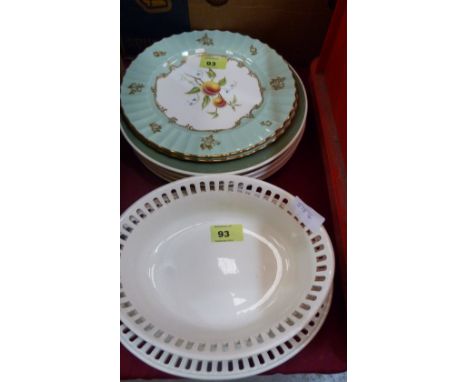 A Wedgwood creamware basket and stand, seven Susie Cooper plates and two Worcester plates