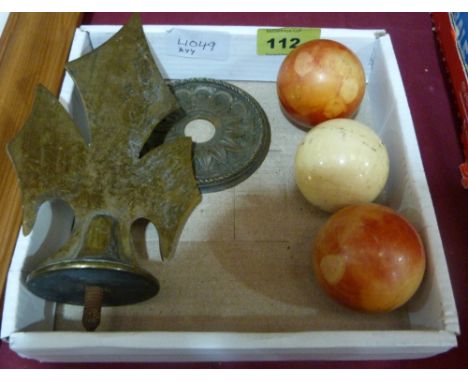 Three ivory snooker balls and two brass items