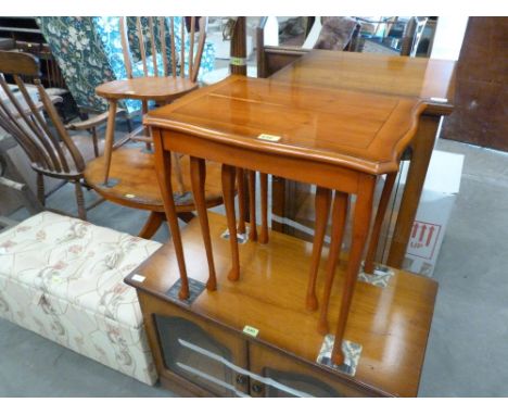 A lamp standard, ottoman and other modern furniture