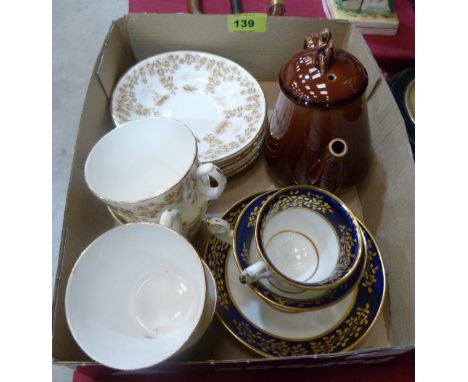 Victorian tea cups and saucers and a brown glazed teapot