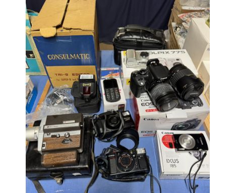 A Canon EOS 350D digital camera together with lenses, a Nikon Coolpix digital camera, an Olympus 35m camera, a Bell & Howell 