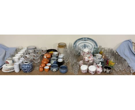 Advertising milk bottles together with drinking glasses, a floral decorated part tea service, Poole pottery, Chinese blue and