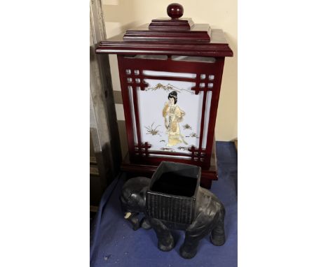 A table lamp decorated with geisha together with an elephant planter 