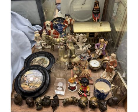 Two pottery pot lids together with a brass gypsy carriage, decorative figures, carved netsuke etc 