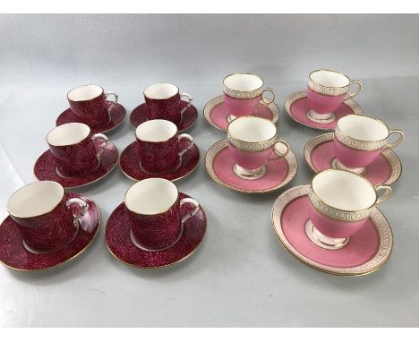 Six coffee cans and saucers in the EMPRESS pattern by Royal Worcester 1973, and a further set of pink cups and saucers
