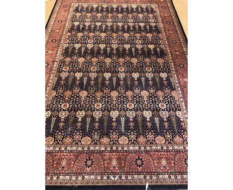 Blue ground carpet with pink borders, approx 310cm x 200cm