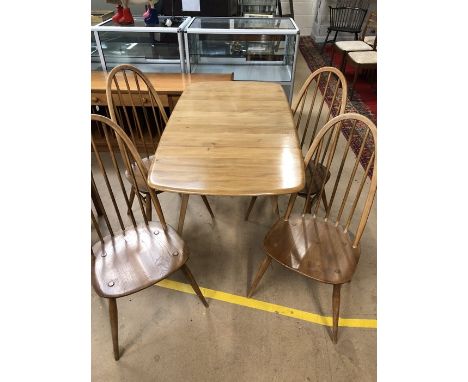 Blonde Ercol Dining table and four stick back chairs