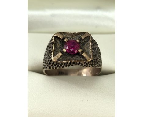 9ct Gold ring (marked 9ct) set with a single red stone size 'S' approx 5.5g