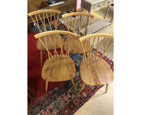 Set of four Ercol sick back chairs