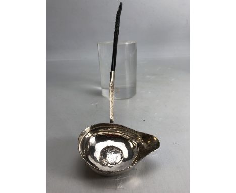 Georgian Silver toddy ladle with twisted handle and a George II coin inset to the bowl