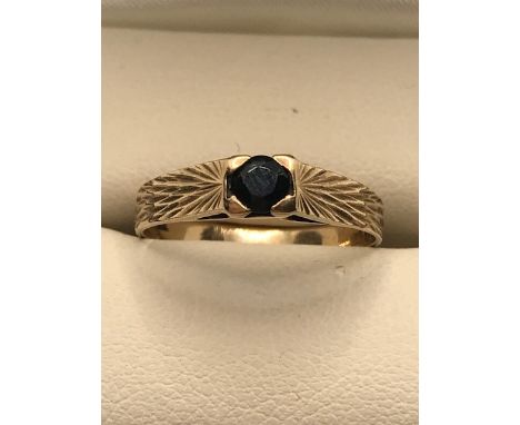 Hallmarked 375 Gold ring with central stone size 'N'