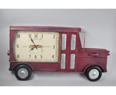 A Modern Novelty 'Retro' Wall Clock in the form of a Vintage Car 