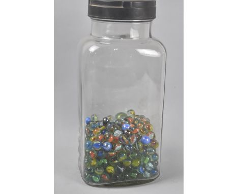 A Vintage Glass Sweet Jar Containing Marbles 