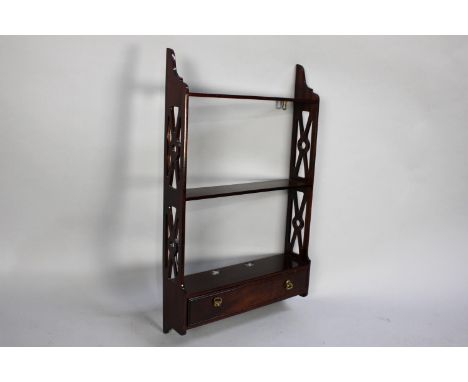 A Modern Mahogany Wall Hanging Shelf Unit with Pierced Supports and Single Base Drawer, 41cms Wide and 58cms High 