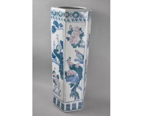 An Oriental Hexagonal Ceramic Stick Stand Decorated with Exotic Birds and Flowers, 63cms High 