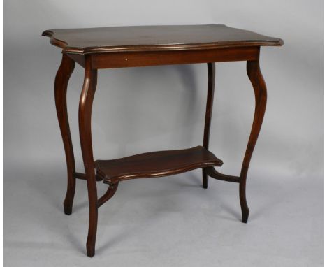 An Edwardian Mahogany Shaped Rectangular Topped Occasional Table with Small Stretcher Shelf, 75cms Wide 