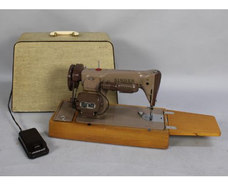 A Vintage Electric Singer Sewing Machine with Foot Pedal and Power Cable 
