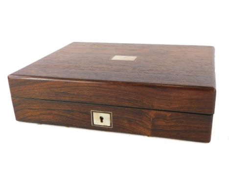 A Victorian and later rosewood writing box, the top with a vacant rectangular mother of pearl cartouche enclosing a fitted in