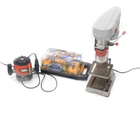 A collection of power tools, a pillar drill, Black and Decker router, etc.  (3)