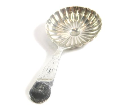 A George III silver caddy spoon, by John Turner, the bowl decorated with a radiating pattern, with a bright cut decorated han