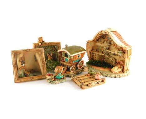 Twelve Pendelfin items, to include the picture frame of Pendelfin rabbits fishing, 26cm high, castle tavern, 31cm high, and t