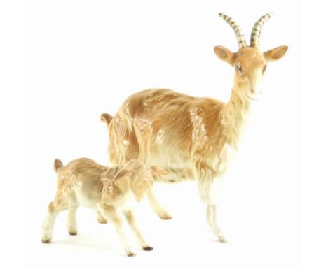 A Beswick ceramic billy goat and a kid. (2)