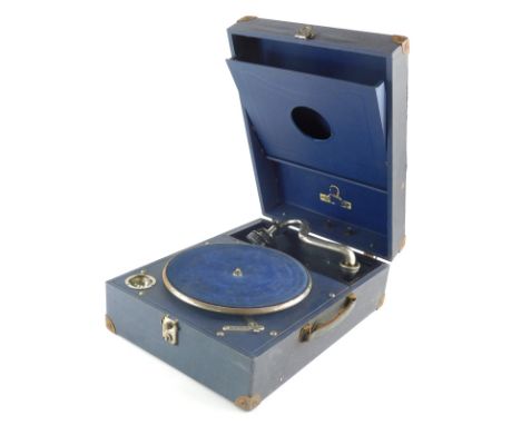 A vintage mid 20thC table top record player, impressed leather case with articulated chrome arm and blue baize lined turn tab