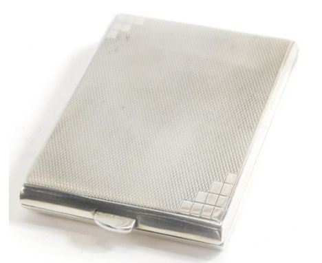 A George V silver match holder, by Goldsmith and Co of Regent Street, London, of rectangular form with engine turned decorati