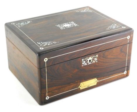 A rosewood and mother of pearl inlaid box, of rectangular form, the hinged lid revealing a leather section with a removable s