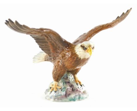 A Beswick ceramic bald eagle, 33cm wide.