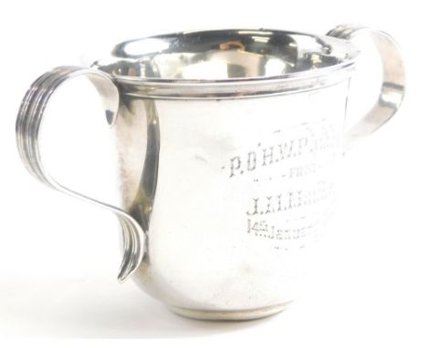 An early 20thC Irish silver loving cup, of plain form with engraved inscription .P.O.H.W. Phibbs from J.M. Maude 14th January