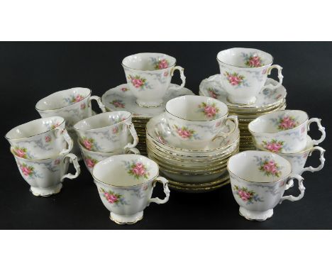 A Royal Albert Tranquility pattern part tea service, comprising twelve tea cups, thirteen saucers, tea plates and cereal bowl