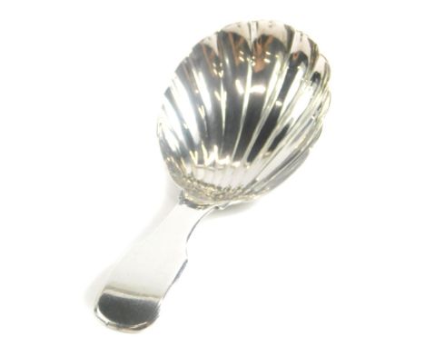 A George IV silver caddy spoon, by William Eaton, with a shell shaped bowl, London 1825, 9cm long.