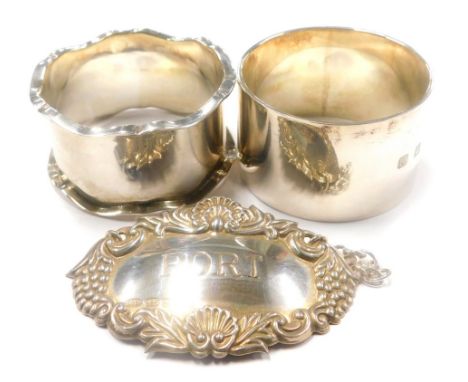 A collection of small silver, Port decanter label and two napkin rings, 2¼oz overall. (3)