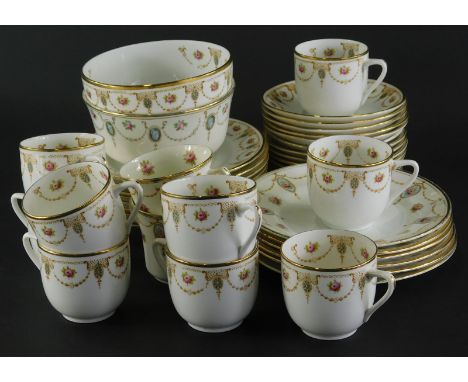 An early 20thC Royal Albert Crown china part tea service, to include cups, 6cm high, saucers, plates, side plates, decorated 