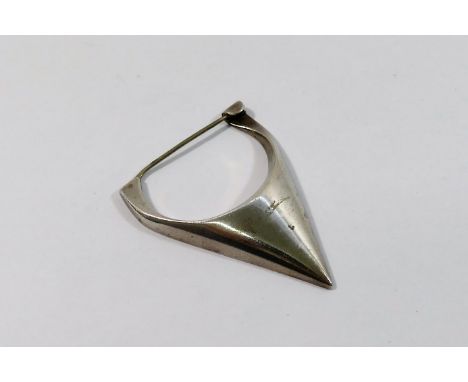 A Georg Jensen silver cloak brooch, in the form of a stylised arrow head, with import marks for London 1963, and maker's mark