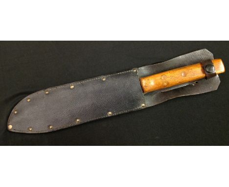 Bowie Knife with 238mm long blade with etched maker mark "Bell Bowie Knife Co, Sheffield, England". Contoured wooden grips. O