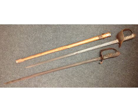 WW2 British Army Officers 1897 pattern sword with single edged fullered blade with Proof mark and etched decoration, retailer