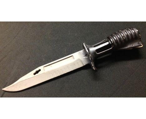 British SA80 Bayonet with 180mm long blade. Much original black finish remains to grip. Working release catch. No markings. O