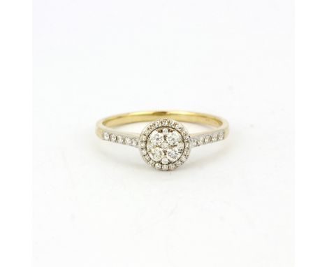 A hallmarked 9ct yellow gold halo ring set with brilliant cut diamonds and diamond set shoulders, (Q.5).