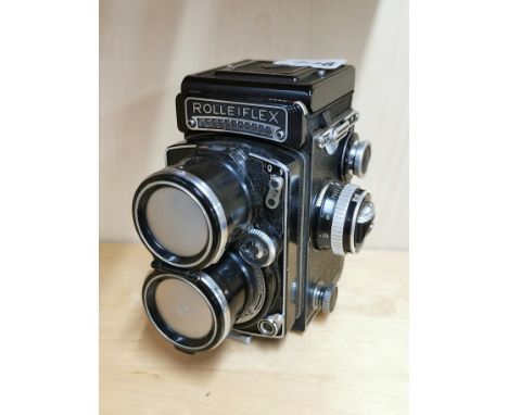 A Rolleiflex twin lens reflex camera.