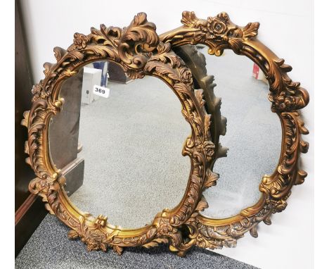 Two vintage gilt plaster framed mirrors, H. 68cm.