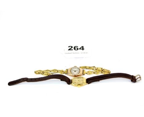Two lady's vintage 9ct gold wristwatches, one with leather strap and the other with gold plated strap.
