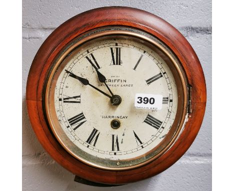 A small 19th century mahogany framed shop clock by Griffin of Harringay, Dia. 27cm.