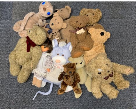 A quantity of vintage soft toys.