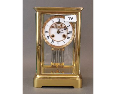 A gilt brass four glass mercury pendulum striking mantle clock, H. 27cm.