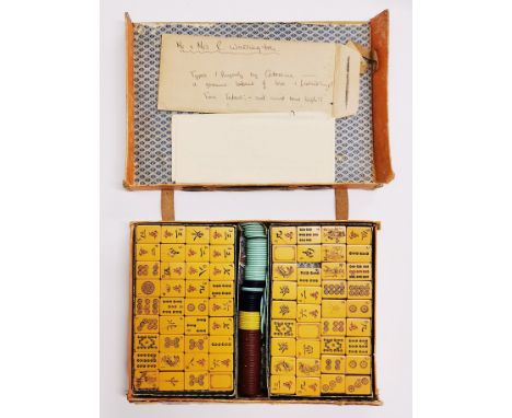 A cased vintage Mah-Jong set.