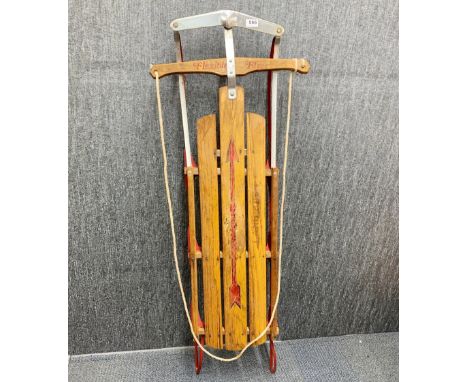 A Flexible Flyer vintage sledge, L. 140cm.