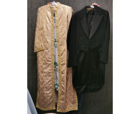 A gentleman's vintage dress coat, size approx. 36-38, together with a vintage Eastern robe.
